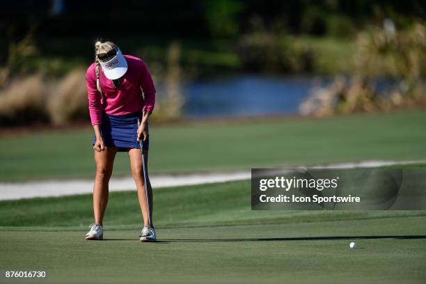 Pernilla Lindberg of Sweden is please with her birdie putt on the seventeenth hole during the third round of the LPGA CME Group Championship at...
