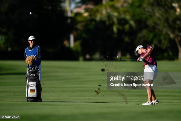 Caroline Masson of Germany hits her approach shot on the seventeenth hole during the third round of the LPGA CME Group Championship at Tiburon Golf...