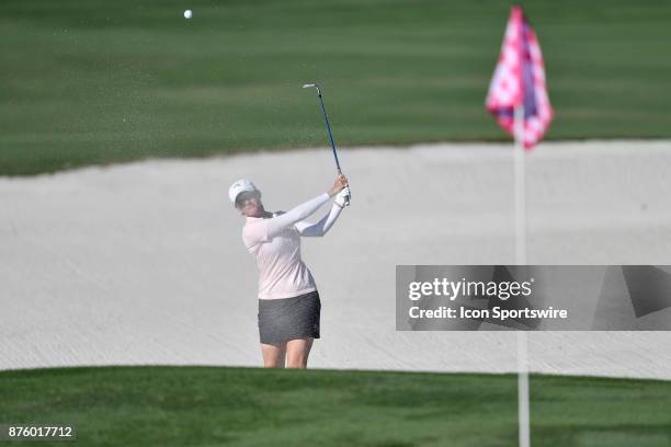 Sarah Jane Smith of Australia plays her shot out of the bunker on the seventeenth hole during the third round of the LPGA CME Group Championship at...