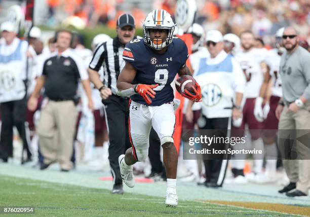 Auburn Tigers running back Kam Martin runs for a touchdown during a football game between the Auburn Tigers and the Louisiana-Monroe Warhawks,...