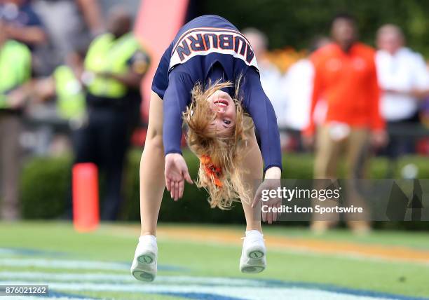 An Auburn cheerleader tumbles after a touchdown during a football game between the Auburn Tigers and the Louisiana-Monroe Warhawks, Saturday,...