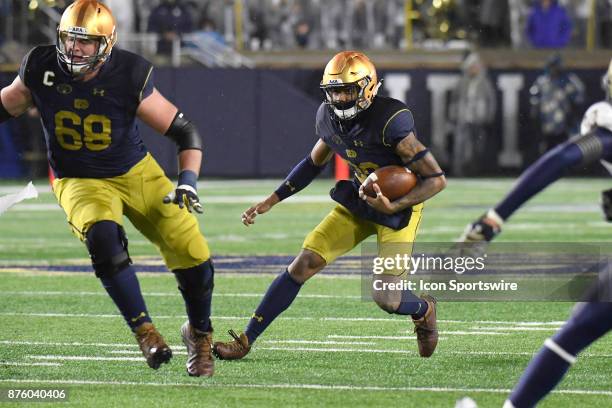 Notre Dame Fighting Irish wide receiver Kevin Stepherson runs with the football during the college football game between the Notre Dame Fighting...