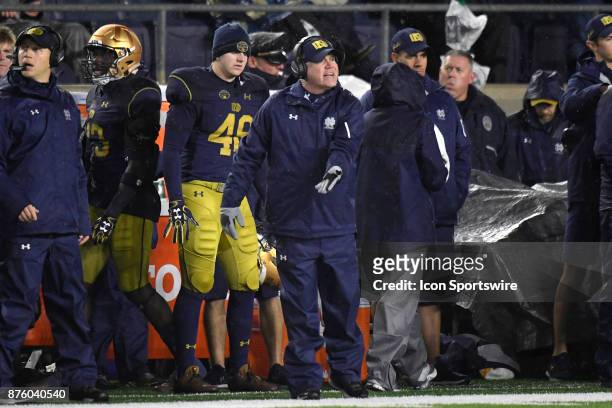 Notre Dame Fighting Irish head coach Brian Kelly calls out onto the field during the college football game between the Notre Dame Fighting Irish and...