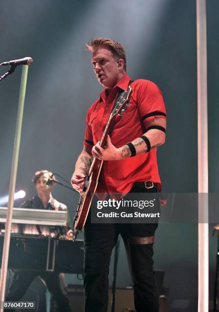 Josh Homme of Queens of the Stone Age performs on stage at Wembley Arena on November 18, 2017 in London, England.