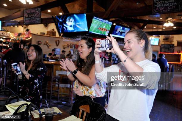 Festivalgoers participate in the 'Search Party' scavenger hunt during Vulture Festival LA presented by AT&T on November 18, 2017 in Hollywood,...