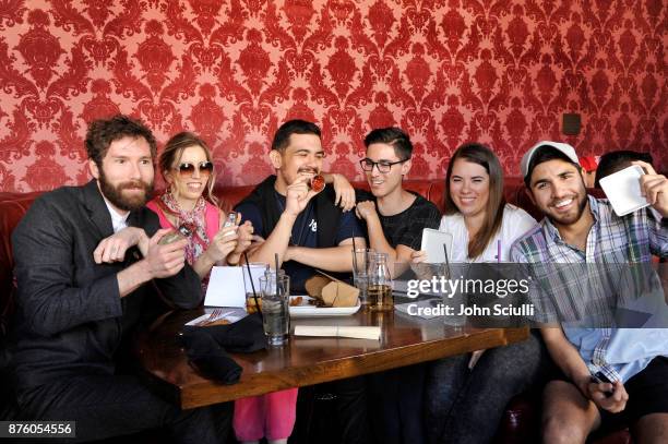 Festivalgoers participate in the 'Search Party' scavenger hunt during Vulture Festival LA presented by AT&T on November 18, 2017 in Hollywood,...