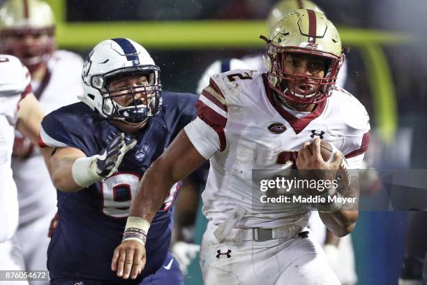 Dillon of the Boston College Eagles runs the ball in for a touchdown during the second quarter against the Connecticut Huskies at Fenway Park on...