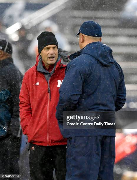 Penn State football coach James Franklin talks with Nebraska head coach Mike Riley before the game Saturday, Nov. 18, 2017 in State College, Pa. Penn...