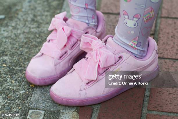 Hiromin , wearing a Milkman denim bomber white and pink jacket, Miracle_on pink skirt with pink stars and white stripe, Puma pink shoes with pink...