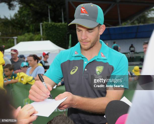 Australian Cricket player Tim Paine signs autographs for fans during the Brisbane Bupa Family Day on November 19, 2017 in Brisbane, Australia.