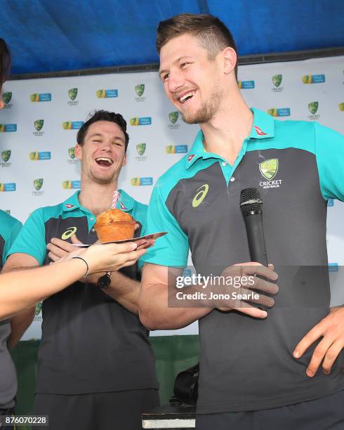 Australian Cricket player Cameron Bancroft smiles as he is wished happy birthday, as team mate Peter Handscomb looks on as they attend the Brisbane...