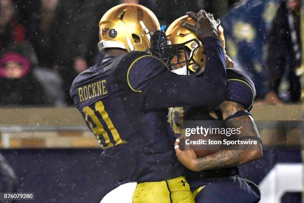 Notre Dame Fighting Irish wide receiver Kevin Stepherson celebrates with Notre Dame Fighting Irish wide receiver Miles Boykin after scoring a...
