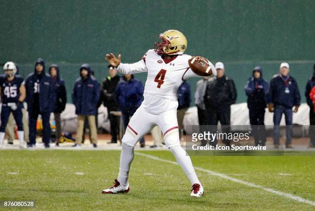 Boston College quarterback Darius Wade rears back to pass during a game between the UCONN Huskies and the Boston College Eagles on November 18 at...