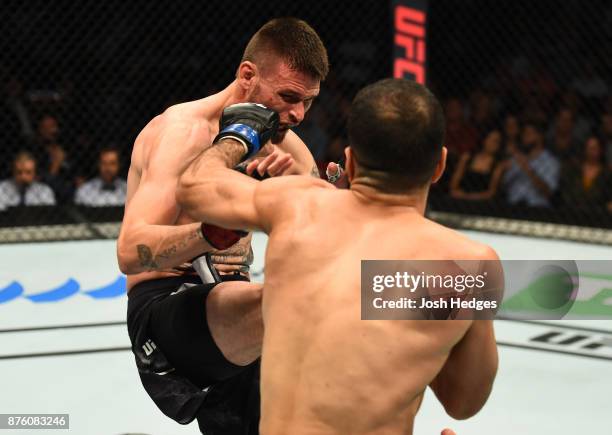 Belal Muhammad punches Tim Means in their welterweight bout during the UFC Fight Night event inside the Qudos Bank Arena on November 19, 2017 in...