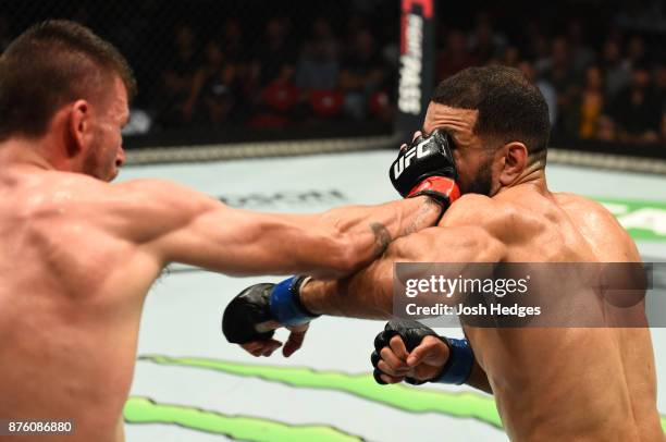 Tim Means accidentally eye pokes Belal Muhammad in their welterweight bout during the UFC Fight Night event inside the Qudos Bank Arena on November...