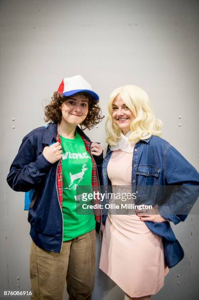 Cosplayers in character as the Millie Bobby Brown character Jane Ives, also known as Eleven and the Gaten Matarazzo character Dustin Henderson from...