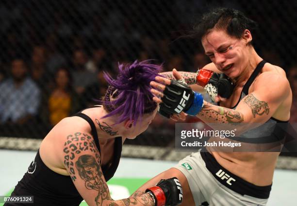 Bec Rawlings of Australia punches Jessica-Rose Clark in their women's flyweight bout during the UFC Fight Night event inside the Qudos Bank Arena on...