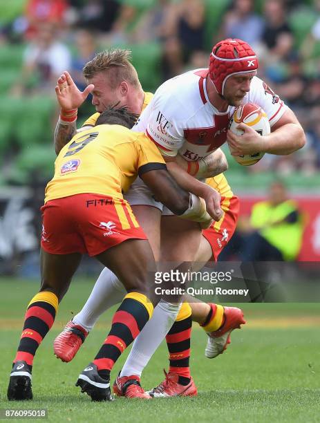 Chris Hill of England is tackled during the 2017 Rugby League World Cup Quarter Final match between England and Papua New Guinea Kumuls at AAMI Park...