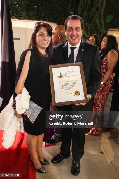 Mayor of Glendale Vartan Gharpetian and Armina Gh arrive at the 2017 HAPAwards at Alex Theatre on November 18, 2017 in Glendale, California.