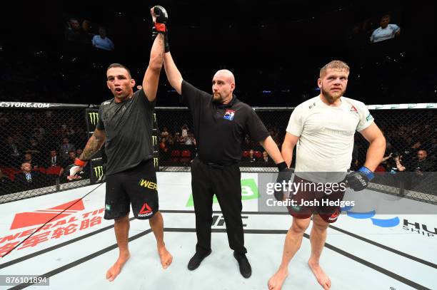 Fabricio Werdum of Brazil celebrates his victory over Marcin Tybura of Poland in their heavyweight bout during the UFC Fight Night event inside the...