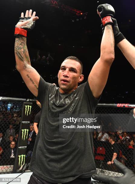 Fabricio Werdum of Brazil celebrates his victory over Marcin Tybura of Poland in their heavyweight bout during the UFC Fight Night event inside the...