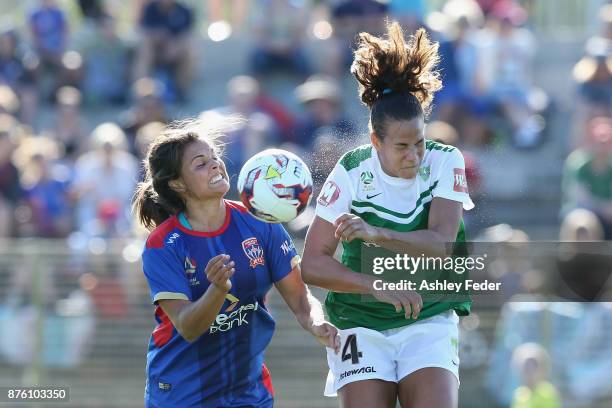 Katherine Stengel of the Jets contests the header against Toni Pressley of Canberra United during the round four W-League match between Newcastle and...
