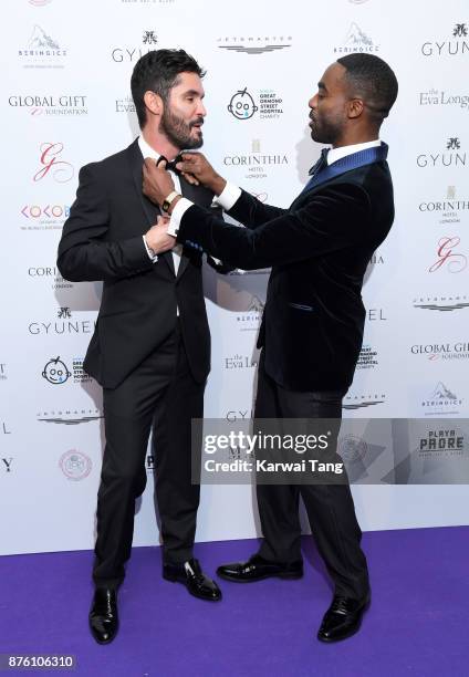 Jean-Bernard Fernandez-Versini and Ore Oduba attend The Global Gift gala held at the Corinthia Hotel on November 18, 2017 in London, England.