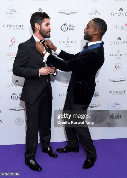 Jean-Bernard Fernandez-Versini and Ore Oduba attend The Global Gift gala held at the Corinthia Hotel on November 18, 2017 in London, England.