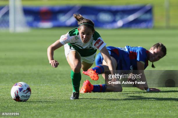 Ashleigh Sykes of Canberra United is tackled by Sophie Nenadovic of the Jets during the round four W-League match between Newcastle and Canberra on...