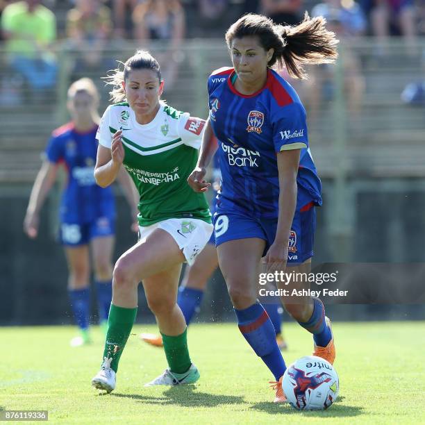 Katherine Stengel of the Jets contests the ball against Liana Danaskos of Canberra United during the round four W-League match between Newcastle and...