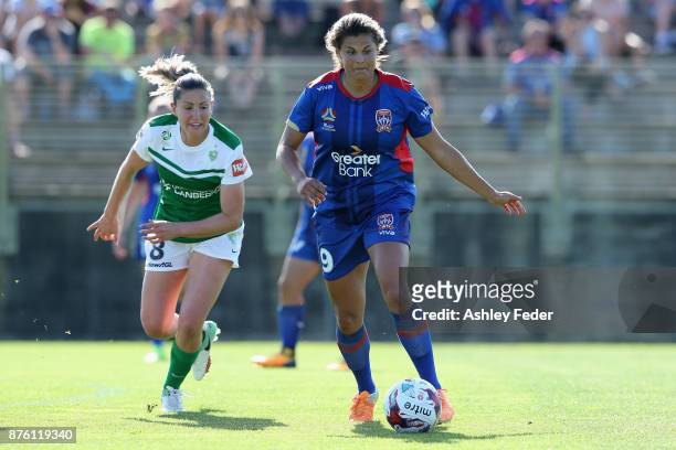 Katherine Stengel of the Jets contests the ball against Liana Danaskos of Canberra United during the round four W-League match between Newcastle and...