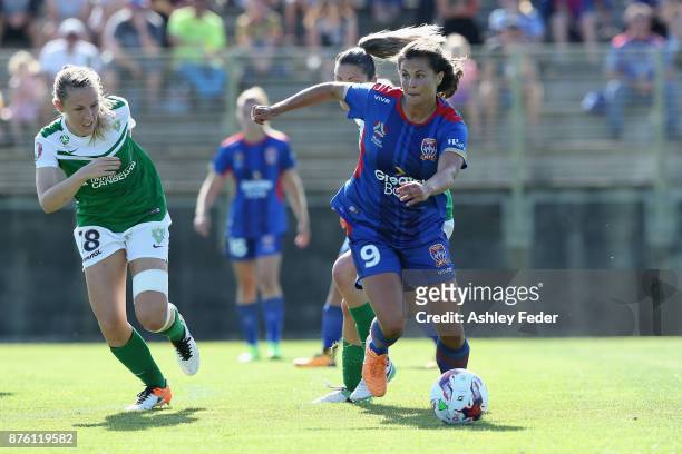 Katherine Stengel of the Jets contests the ball against Taren King of Canberra United during the round four W-League match between Newcastle and...