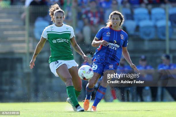 Katherine Stengel of the Jets contests the ball against Toni Pressley of Canberra United during the round four W-League match between Newcastle and...