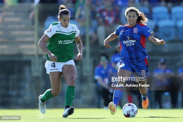 Katherine Stengel of the Jets contests the ball against Toni Pressley of Canberra United during the round four W-League match between Newcastle and...