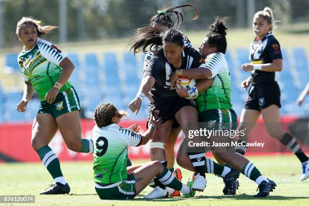 Lilieta Maumau of New Zealand is tackled during the 2017 Women's Rugby League World Cup match between New Zealand and Cook Islands at Southern Cross...