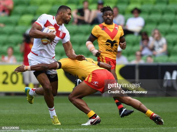 Kallum Watkins of England is tackled during the 2017 Rugby League World Cup Quarter Final match between England and Papua New Guinea Kumuls at AAMI...