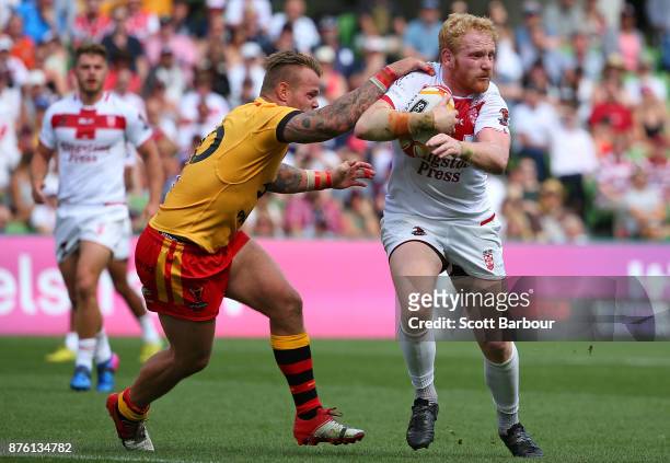 James Graham of England runs with the ball during the 2017 Rugby League World Cup Quarter Final match between England and Papua New Guinea Kumuls at...