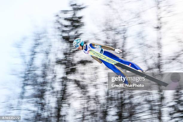 Michael Hayboeck , competes in the team competition during the FIS Ski Jumping World Cup on November 18, 2017 in Wisla, Poland.