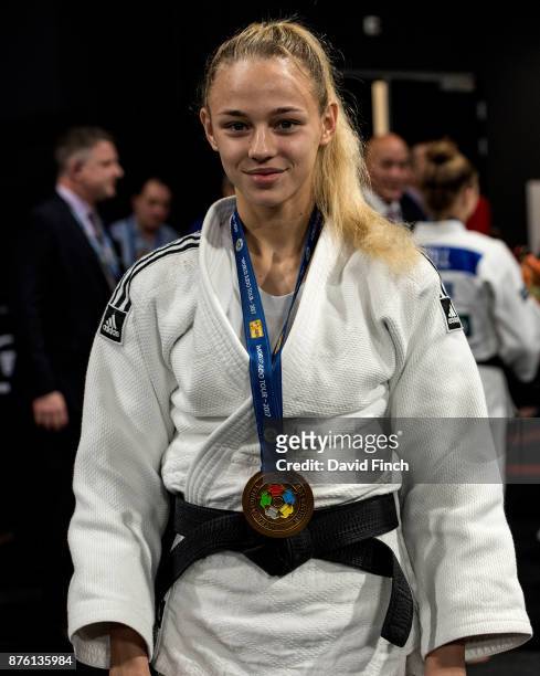 Daria Bilodid of Ukraine who was World Cadet champion at the age of 15 and Senior European champion at 16 poses wearing her gold medal after the...
