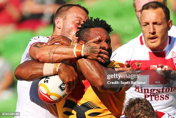 Garry Lo of the Kumuls is tackled during the 2017 Rugby League World Cup Quarter Final match between England and Papua New Guinea Kumuls at AAMI Park...