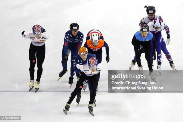 Kwak Yoon-Gy of South Korea, Keith Carroll of United States and Sjinkie Knegt of Netherlands compete in the Men 5000m Relay Final A during the Audi...