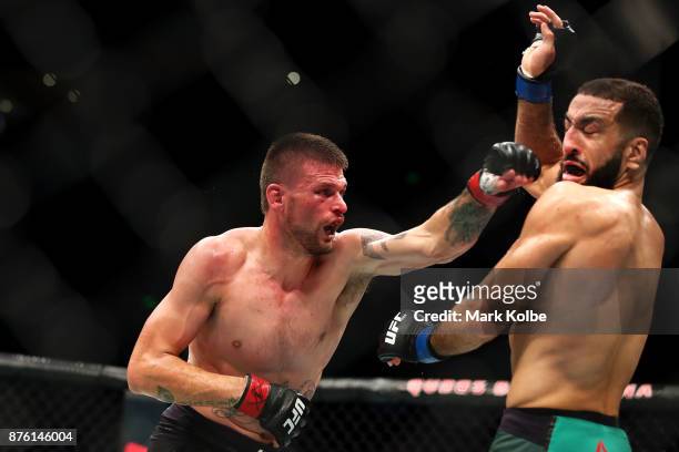 Tim Means of the USA punches Belal Muhammad of the USA in their welterweight bout during the UFC Fight Night at Qudos Bank Arena on November 19, 2017...
