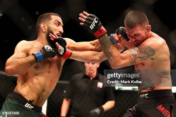 Belal Muhammad of the USA kicks Tim Means of the USA in their welterweight bout during the UFC Fight Night at Qudos Bank Arena on November 19, 2017...