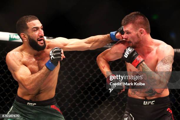 Belal Muhammad of the USA kicks Tim Means of the USA in their welterweight bout during the UFC Fight Night at Qudos Bank Arena on November 19, 2017...