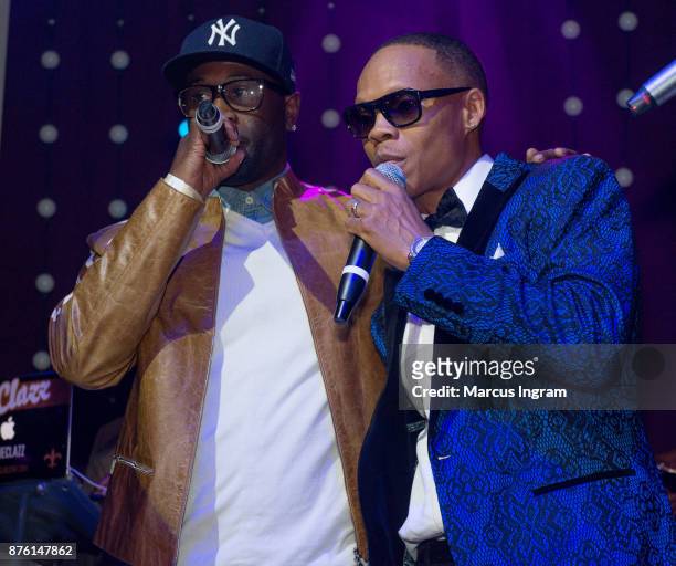 Singers Q Parker and Ronnie DeVoe perform onstage during his 50th birthday celebration at Revel on November 18, 2017 in Atlanta, Georgia.