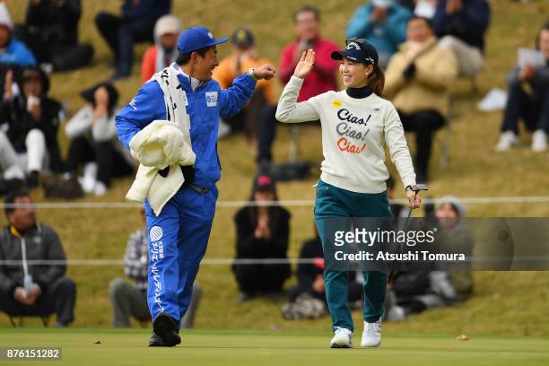 Momoko Ueda of Japan celebrates after making her birdie putt on the 9th hole during the final round of the Daio Paper Elleair Ladies Open 2017 at the...