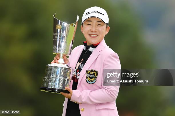 Jiyai Shin of South Korea poses with the trophy after winning the Daio Paper Elleair Ladies Open 2017 at the Elleair Golf Club on November 19, 2017...