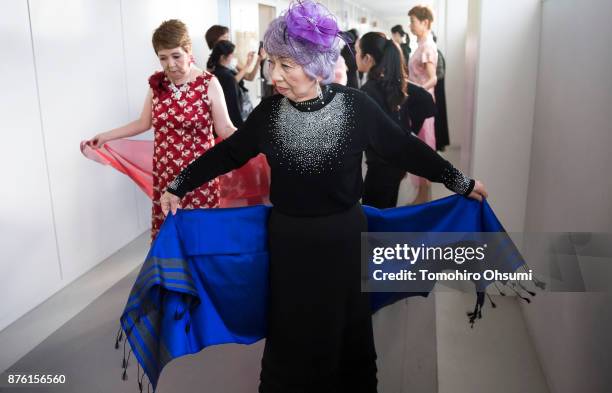 Models prepare backstage during the Gamo Colle or Sugamo Collection 2017 show on November 19, 2017 in Tokyo, Japan. About 22 models aged between 50...