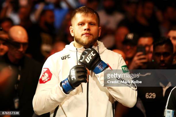Marcin Tybura of Poland prepares to enter the Octagon before facing Fabricio Werdum of Brazil in their heavyweight bout during the UFC Fight Night at...