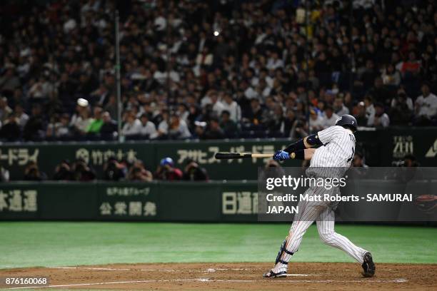 Infielder Shuta Tonosaki of Japan hits a RBI double to make it 1-0 in the bottom of fourth inning during the Eneos Asia Professional Baseball...